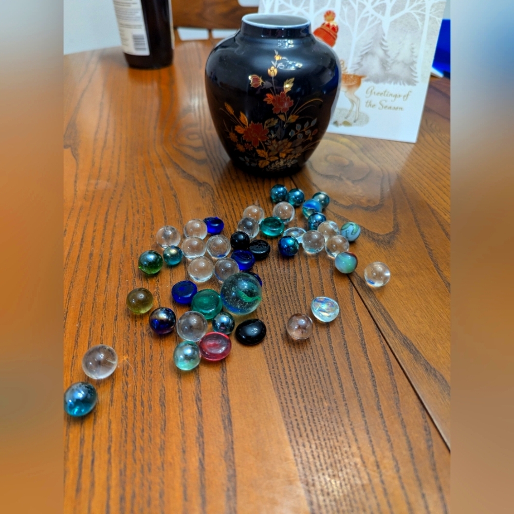 Vintage Marbles with black vase.  Some marbles may not be vintage.